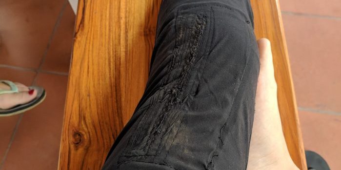 Repaired pants still dirty after moto accident.